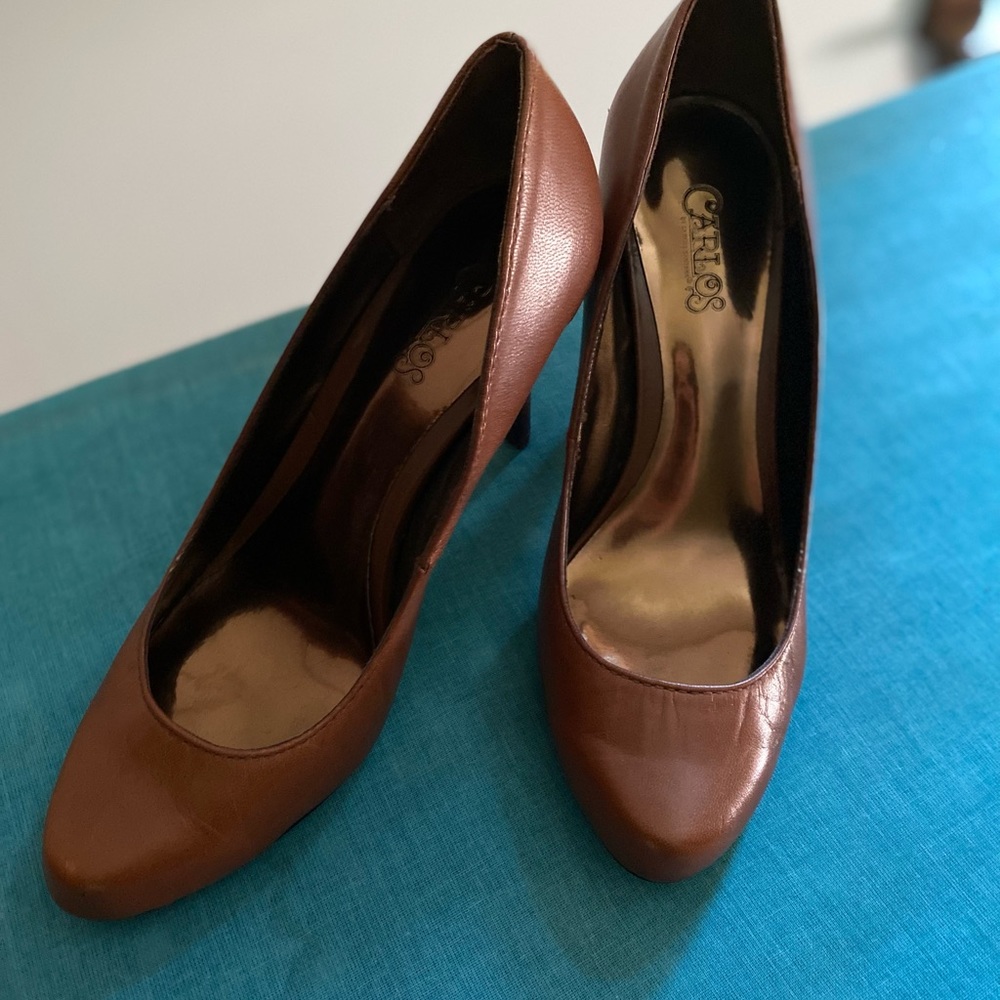Saddle brown leather pumps